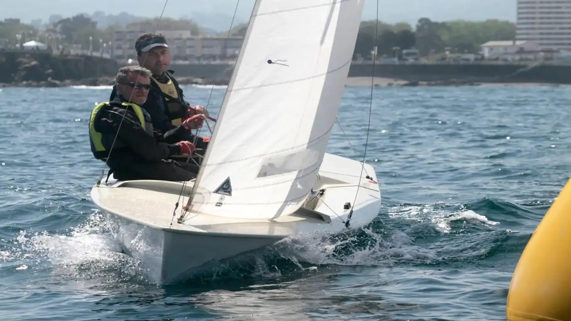 Marqués-Fernández (Snipe), Jáudenes (Optimist) e il comando López (FEVA) nell'estate di Gijón